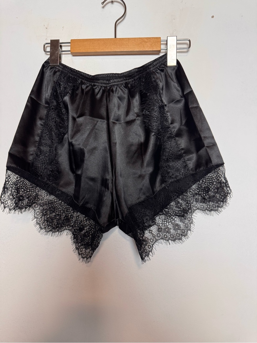 Black faux silk shorts with lace detail size-Small